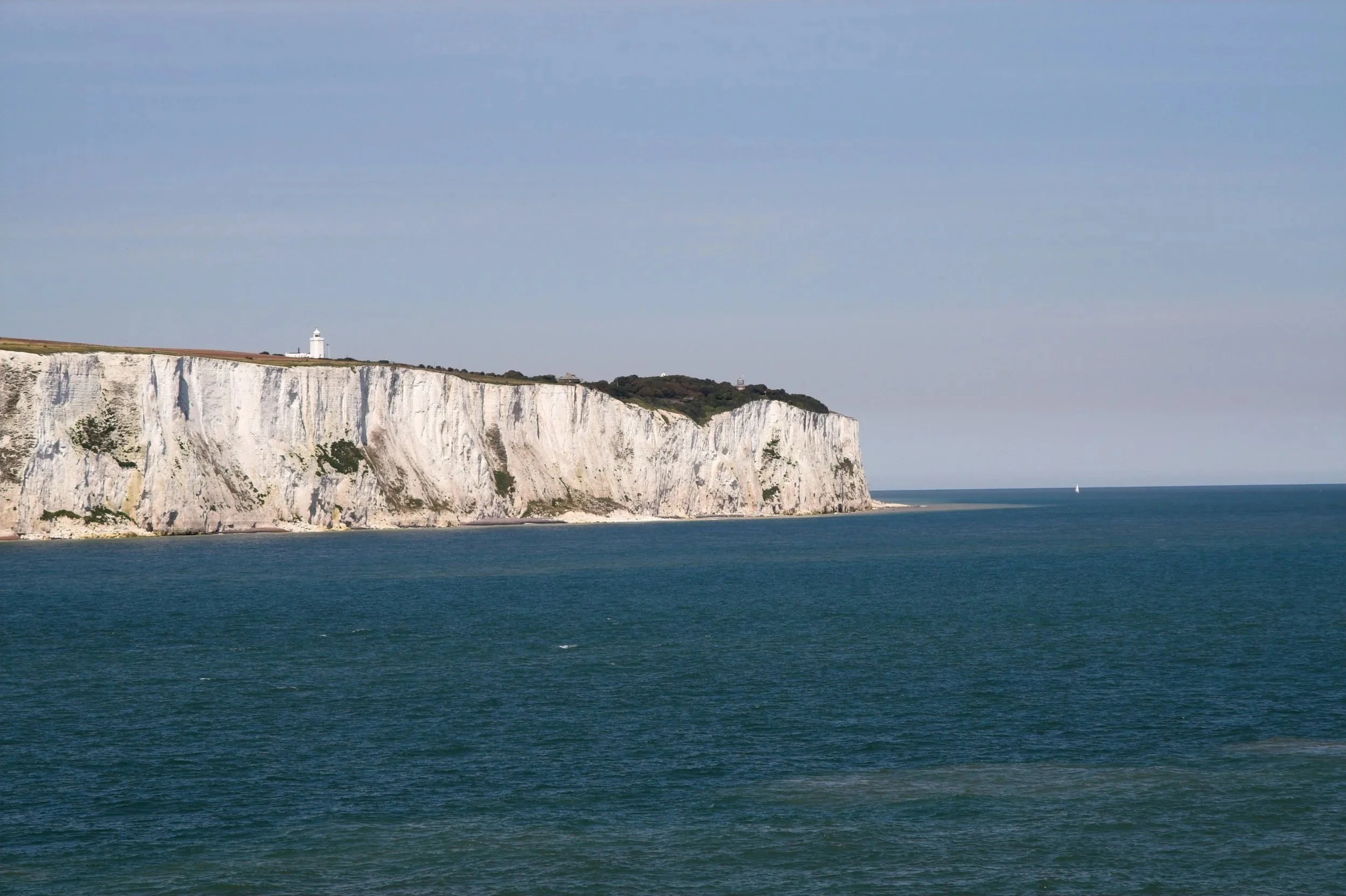 Geometric drawing of an outline square with sections divided by vertical, horizontal, and diagonal lines.