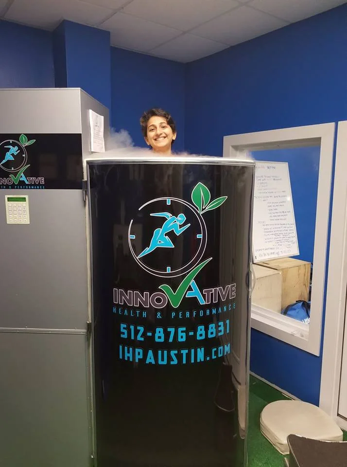 Person in Innovate Health and Performance cryotherapy chamber