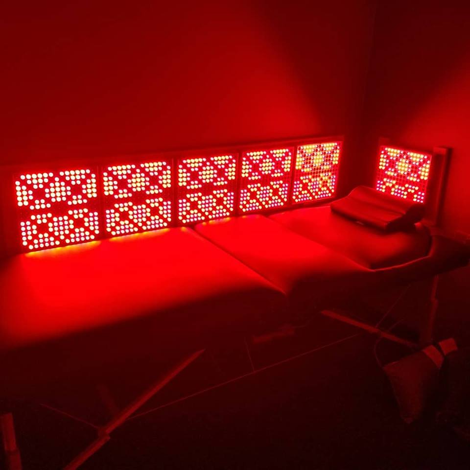 Bed inside the Innovative Health and Performance REDjuvenator red light therapy chamber