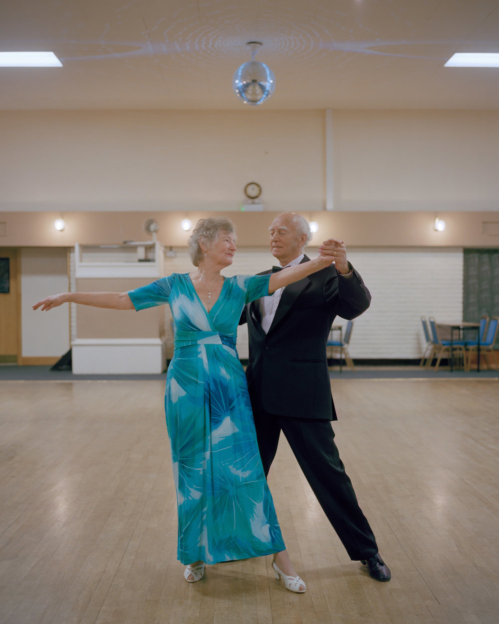 Bill, an ex-miner, with his partner Pauline attending their Ballroom Dancing class, Forest Town Miners' Welfare, Nottinghamshire.