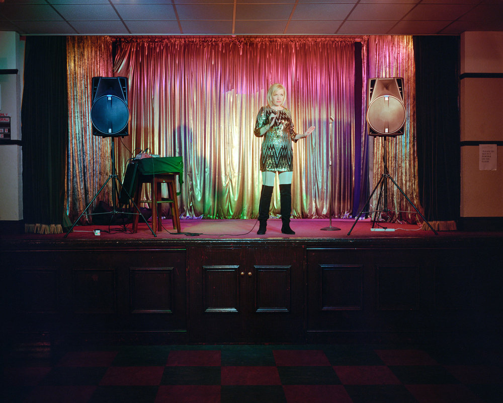 Jo, a club singer, performing at Mansfield Woodhouse Ex-Servicemen's Club, Nottinghamshire.