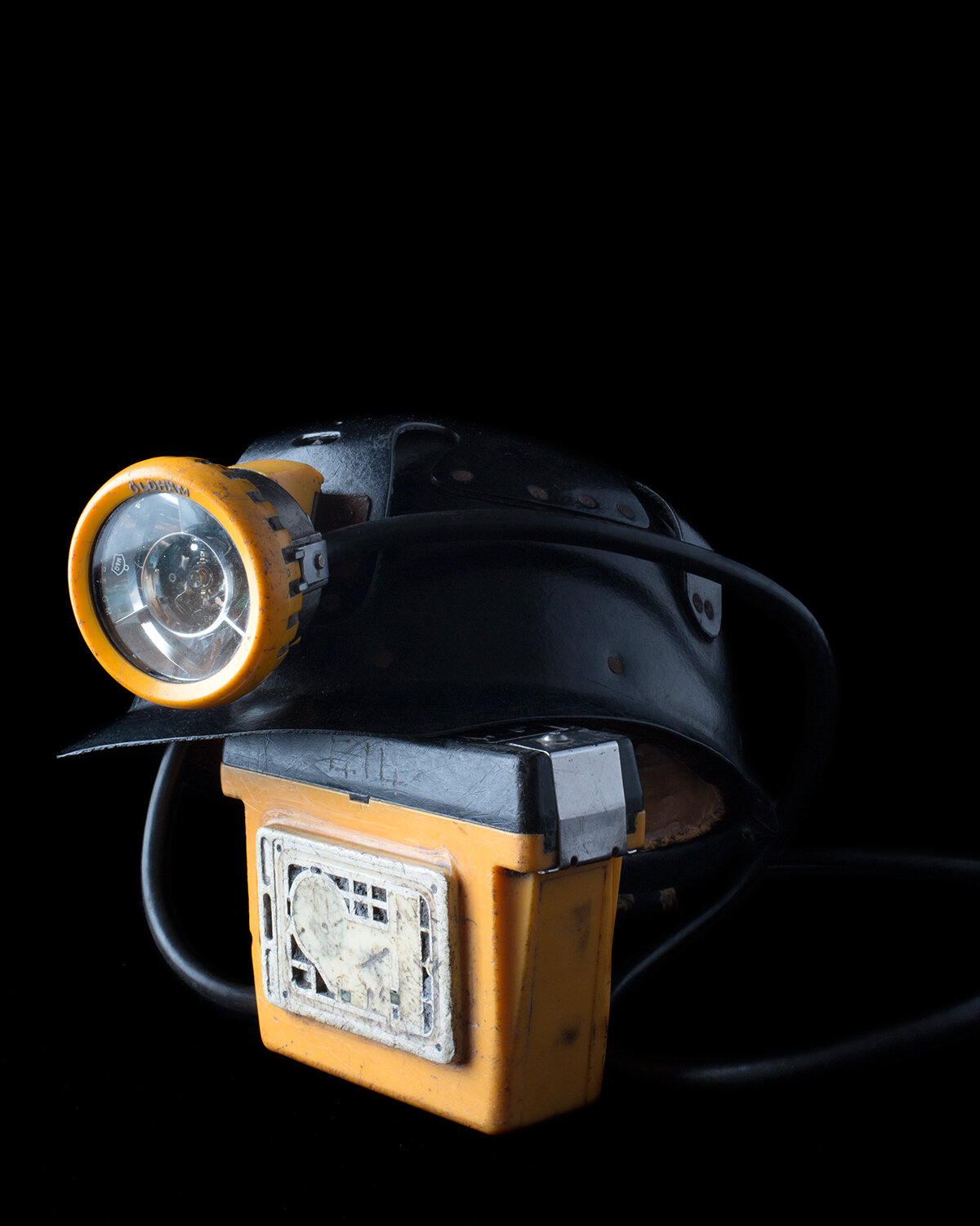Miners helmet, cap lamp and battery pack