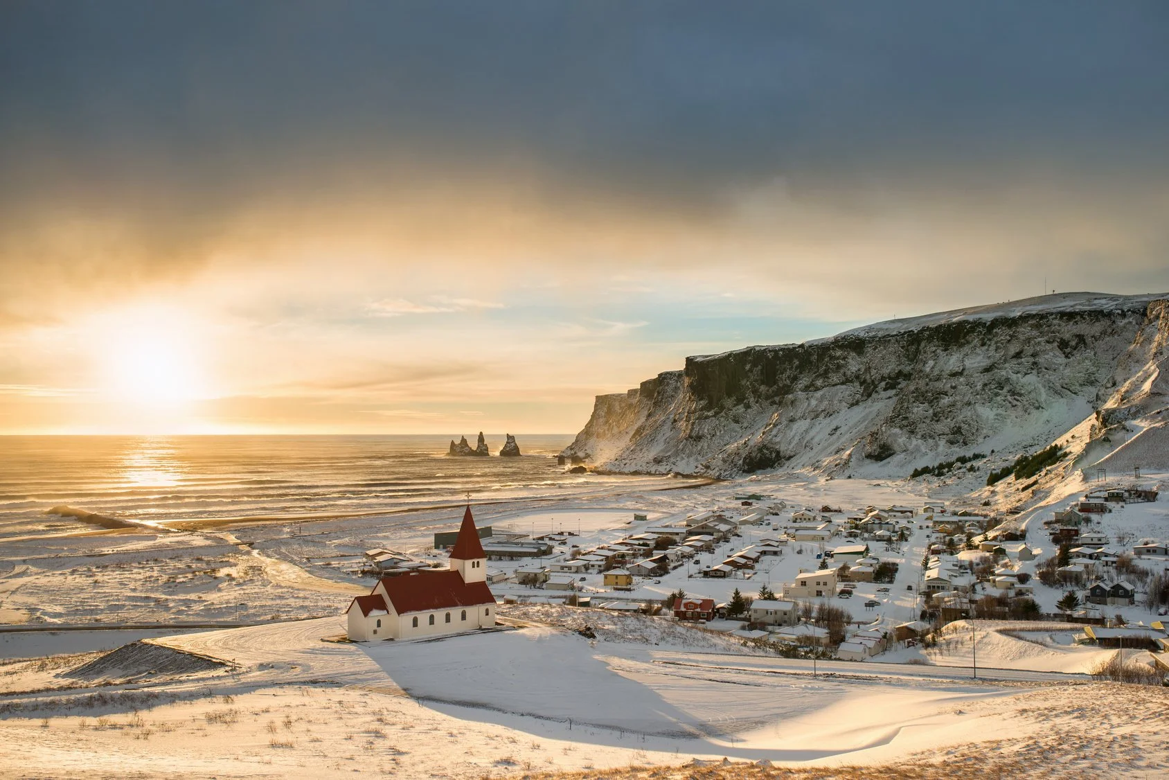 vik-church-snow-cliffs-sunset-tour-reynisdrangar - Snaeland 4.26.jpg