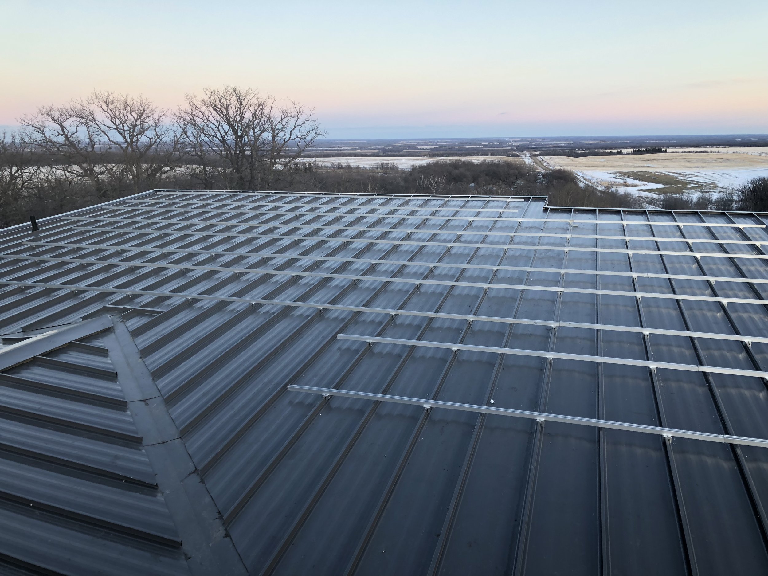 Example Standing Seam S5 Racking.jpg