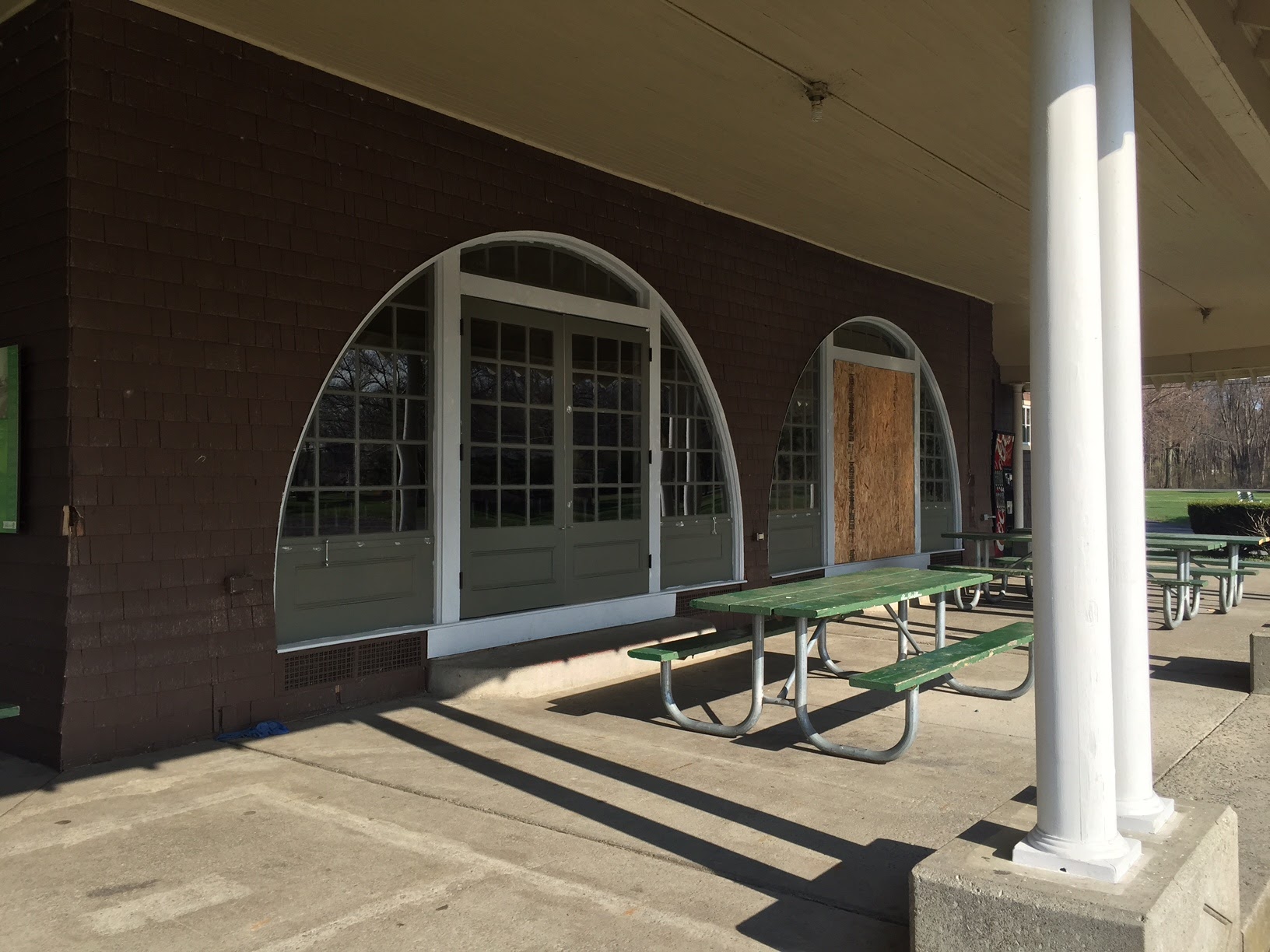 The Picnic Pavilion (often called the Large Pavilion) is the public face of Stewart Park for many Ithacans and visitors to the park. Most every summer evening it is rented for parties and special events. The pavilion has been the home of the Stewart Park Day Camp, which has served thousands of children from Ithaca and Tompkins County over the past thirty years. Age and heavy use have taken a toll on this beautiful shingle-style building and major renovations are now underway. Volunteers have painted the building’s exterior and city crews have repaired columns. The city of Ithaca rebuilt the bathrooms with support from the Town of Ithaca and the Topmkins County Tourism Program. On the spring of 2016, 3 north-facing semi-circular door and window units were restored. Funds are now being raised by the Friends of Stewart Park to complete building restoration. See a detailed description in PDF format here .