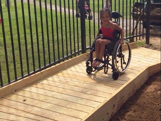 wheelchair girl on carousel ramp.jpg