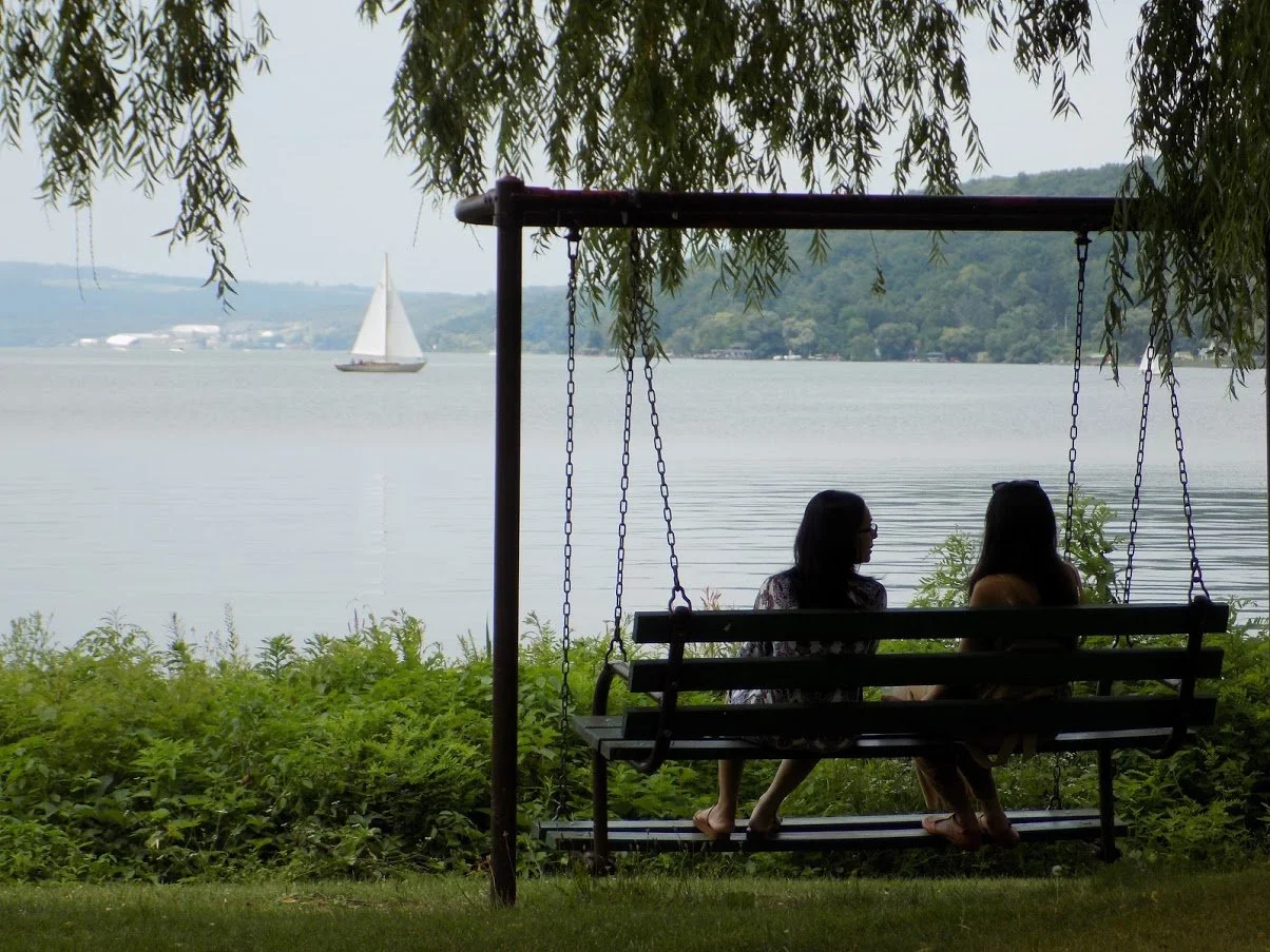 stewart park swing bench with sail boat.JPG