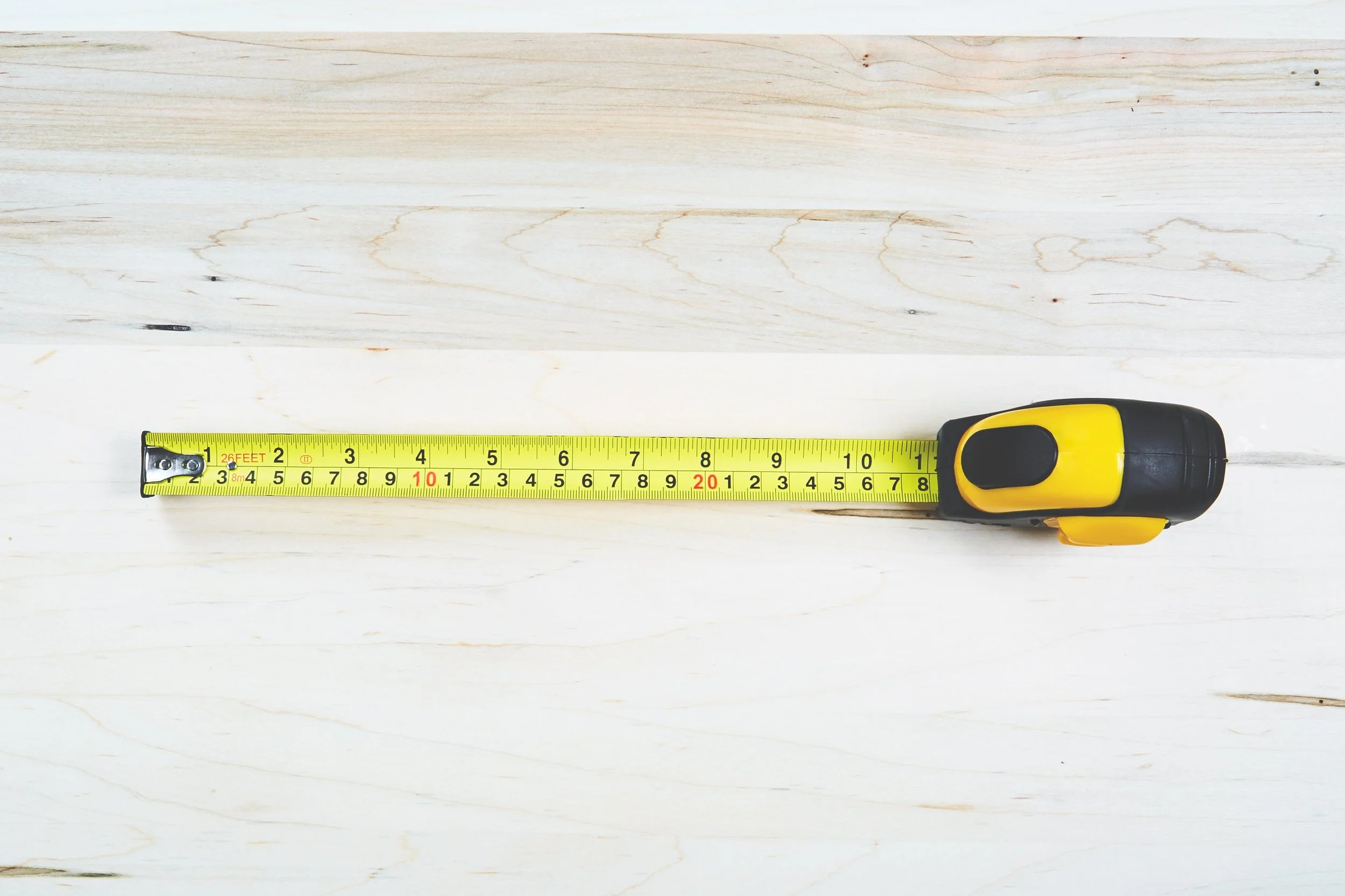 tape-measure-on-wood_4460x4460.jpg