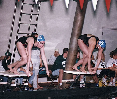 College swim meet. I'm the one on the left with the faster start off the blocks. :)