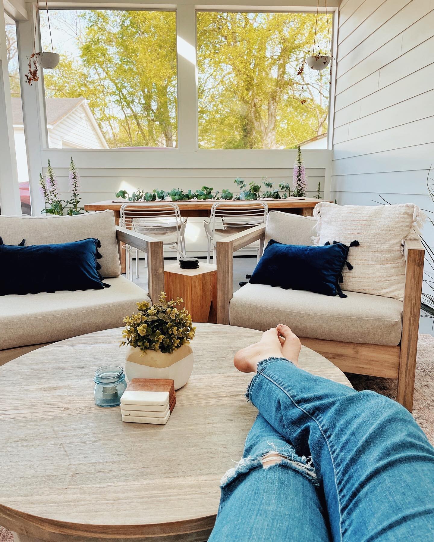 This patio was made for those perfect spring days, with the sweet floral scents hanging in the cool air, and the gentle breezes ruffling up the brand new leaves on the nearby trees. 

Now I have a baby girl in one arm, a pup snuggled up next to me, a