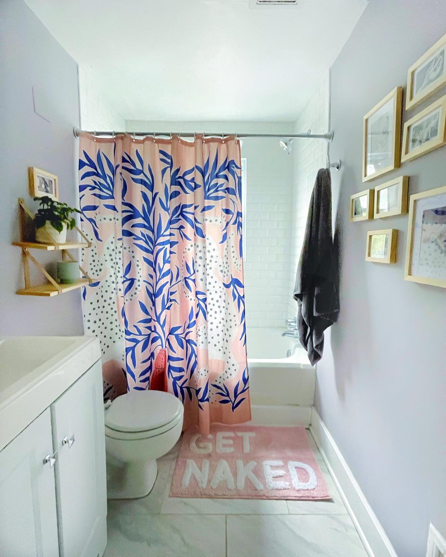 Savannah&rsquo;s Apartment Part II: The Bathroom is complete! Savannah said specifically for this space that she wanted a super fun shower curtain, some storage solutions for her towels and toiletries, and loved the idea of pictures/drawings of nude 