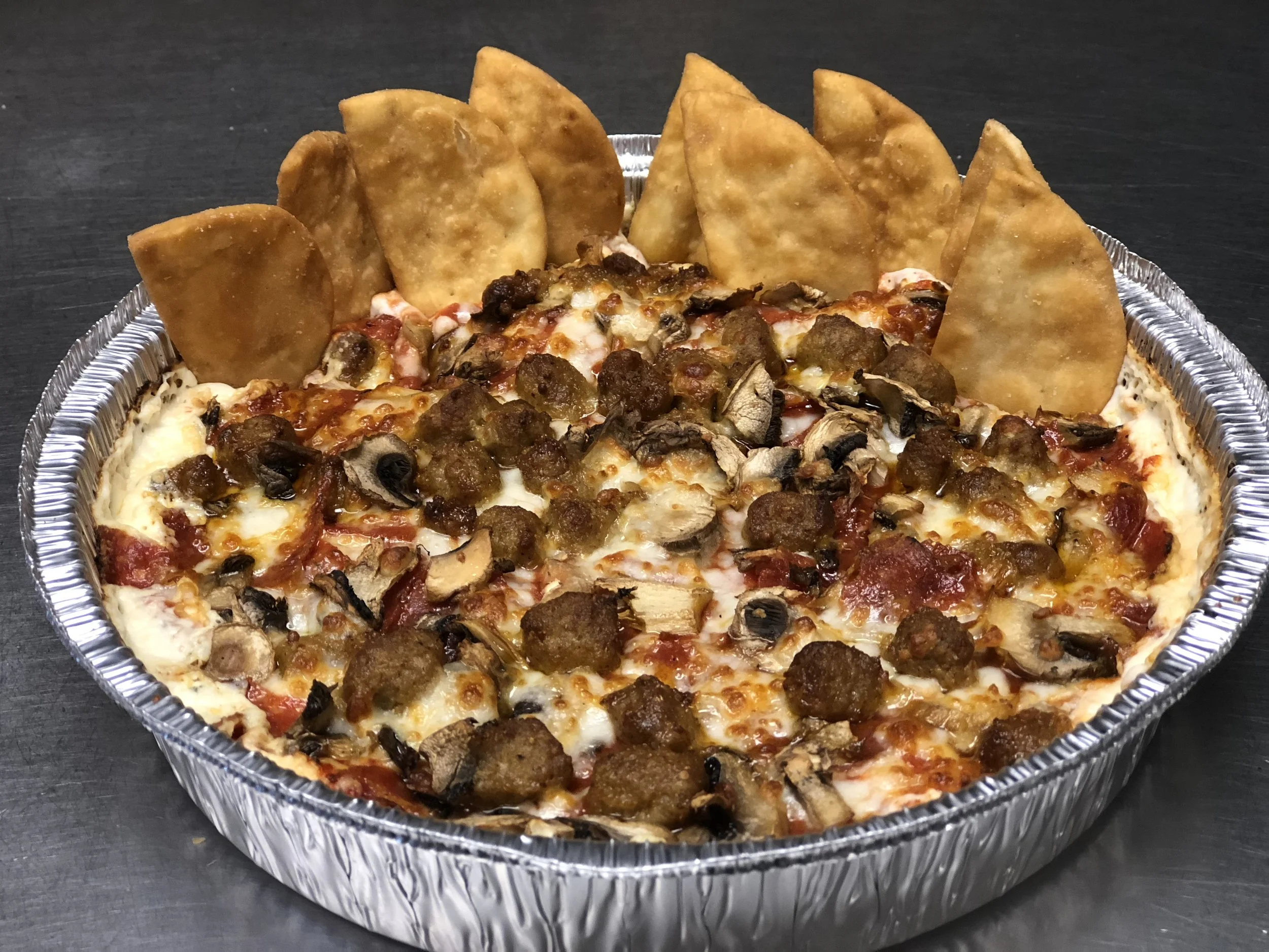 Piper’s Party Dips! Pizza Dip: Our secret Pizza Dip includes a cheesy, slightly spicy base, covered with our own, house-made marinara and mozzarella cheese, with your choice of one topping. Served with pita chips. Small: 8.99 Large: 11.99 Add extra items: 1.25 each Spinach Artichoke Dip: Our House-Made spinach artichoke dip. Served with pita chips. Add 4 Buffalo Chicken Dip : Our dip base with chicken, piping wing sauce, and mozzarella cheese. Served with pita chips. Small: 8.99 Large: 11.99