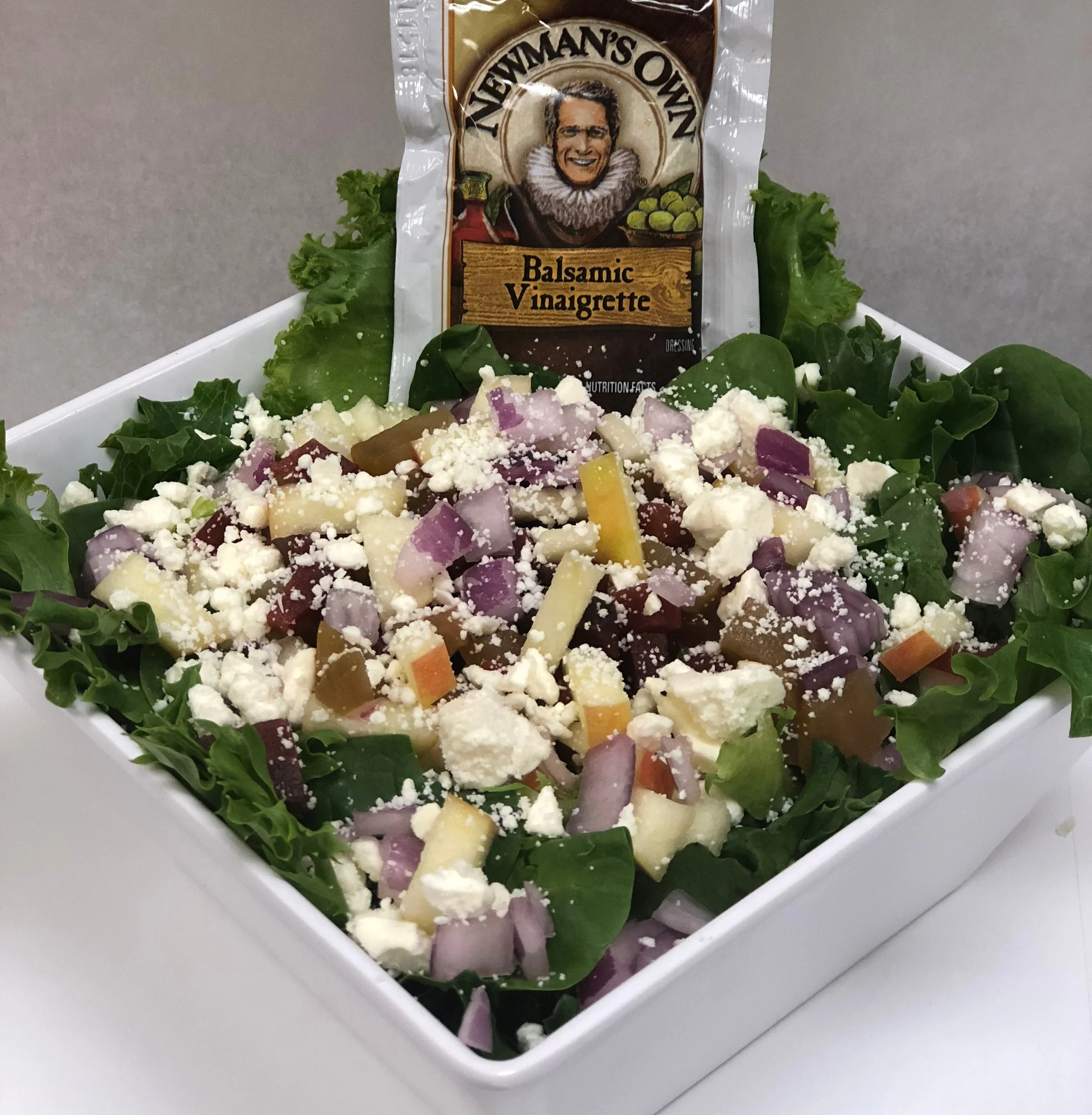 Heart Beet Salad This tasty salad starts with a mix of emerald lettuce and spinach then gets topped with onions, feta cheese, red and yellow beets, chopped apples and is served with a balsamic dressing. Small: 6.84 Large: 8.73
