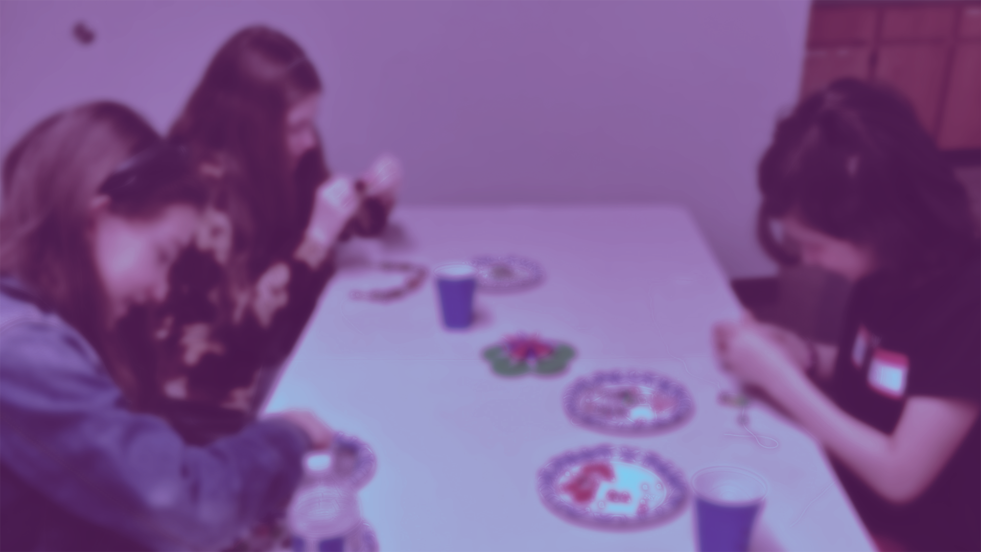 girls at table.png