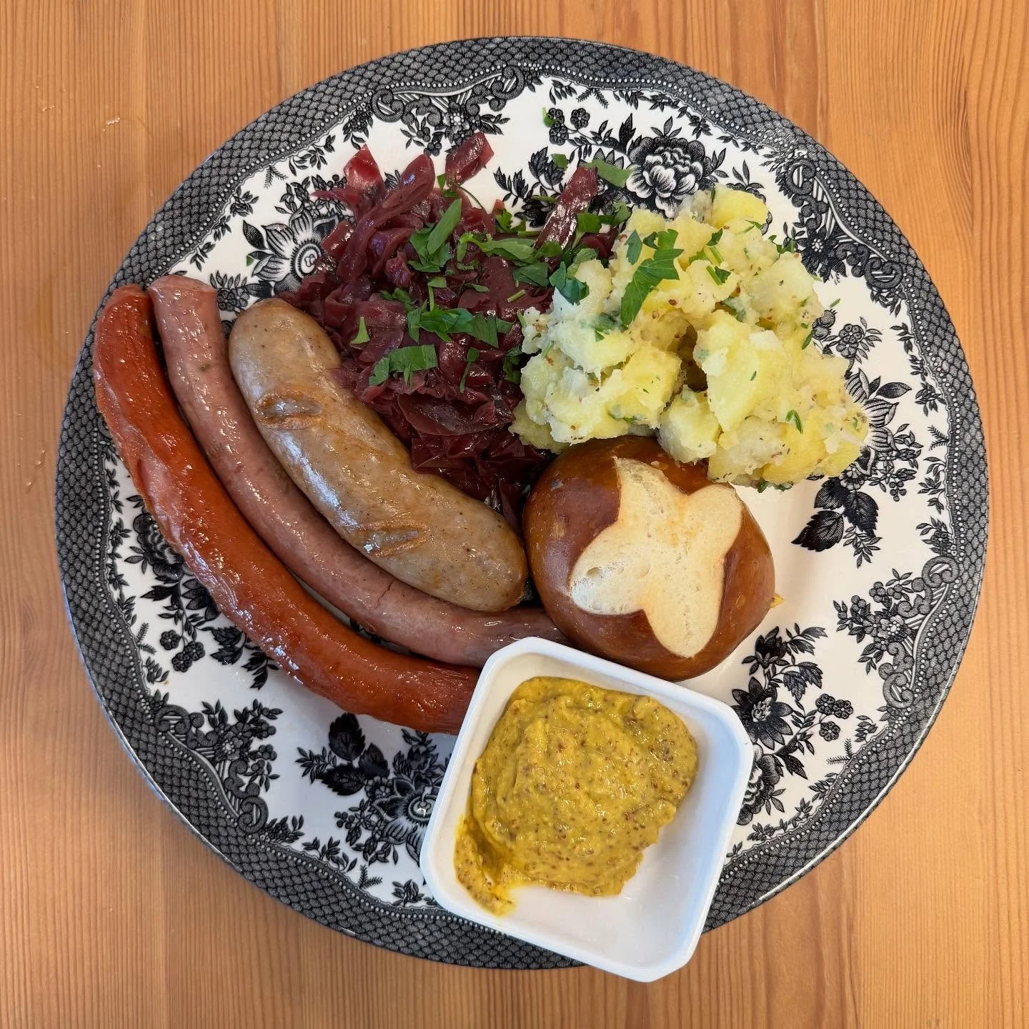 The first week of Oktoberfest! We got Scott here enjoying a beer and our mega sausage plate! It has Bratwursts, Bockwurst, and Nuremberger. Come and join us with a glass of beer and fun time at Westport or Fairfield!