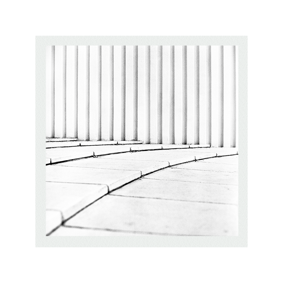 Artistic black-and-white photography explores Brutalist philosophy and architecture.
