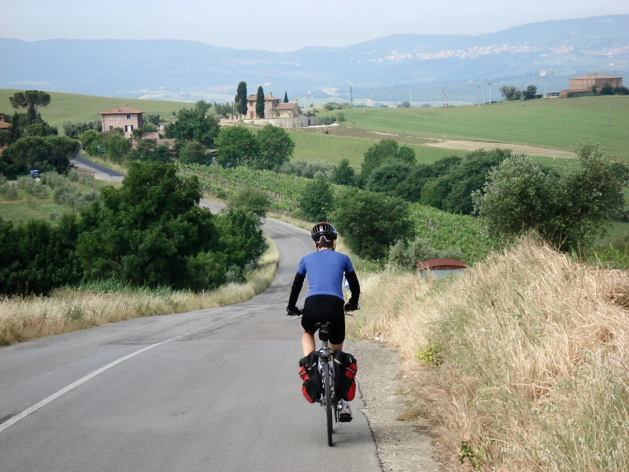 Renee cycling on a bike tour in Italy.