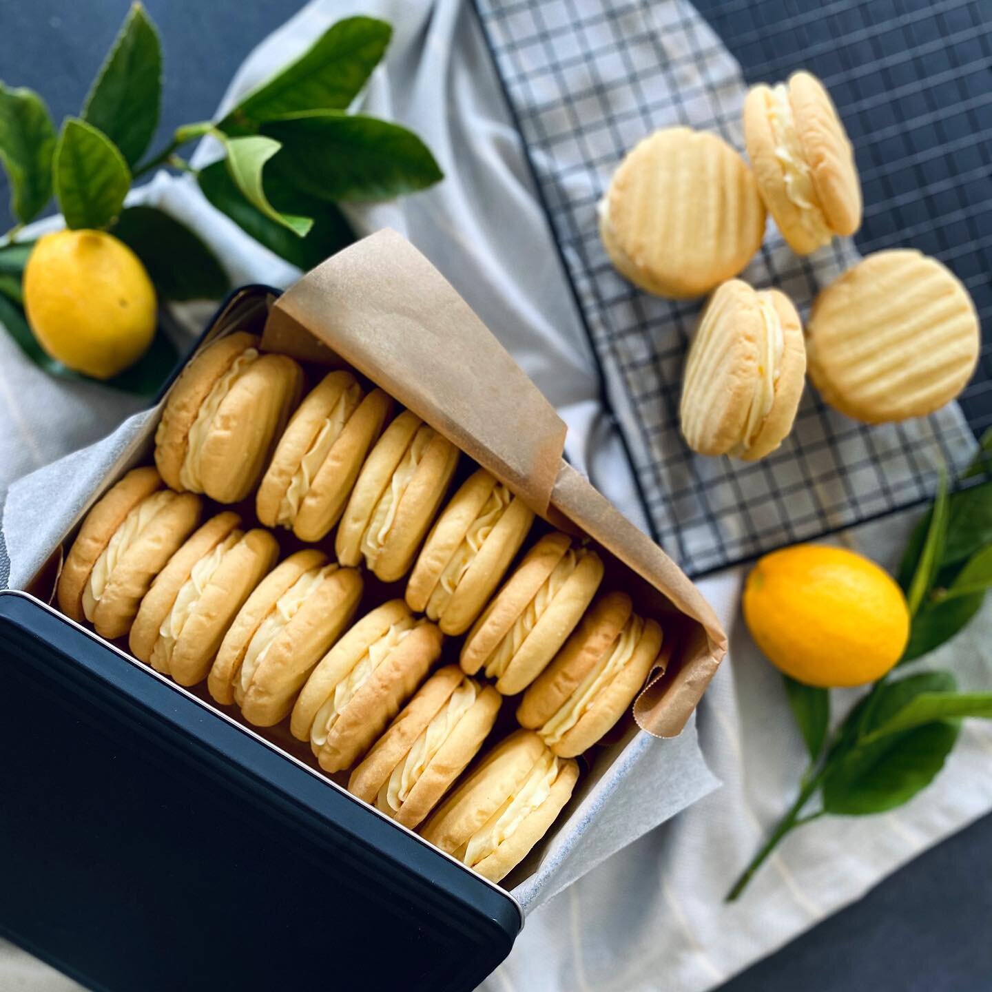 Back on the biscuit wagon today... Lemon Melting Moments this time.  Will get the recipe on the website soon! 💛
.
.
.
Cute little biscuit tin from @kookerystore 
.
.
.
#meltingmoments #lemons #biscuits #shortbread #pastry #pastrycook #pastrychef #bi