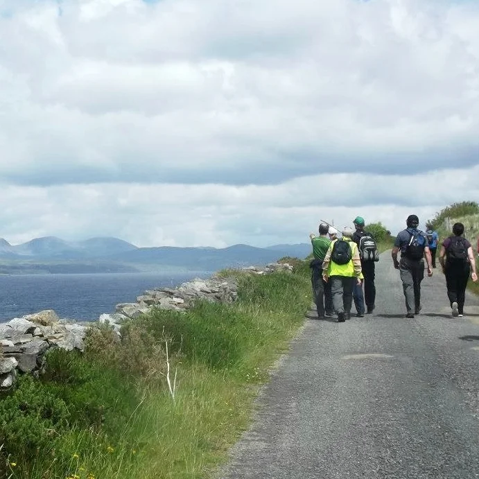 Local hillwalkers along Kenmare Bay.
