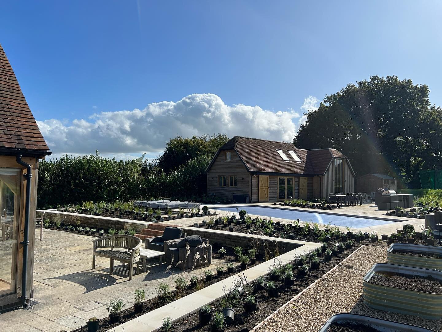 Setting out in the ☀️. Hedging and trees to come. Lovely day for it. Wouldn&rsquo;t mind a dip in that pool! #gardendesign #dorsetgardens #gardendesignerdorset #plantsmakepeoplehappy #plantingplans #gardendesigndorset
