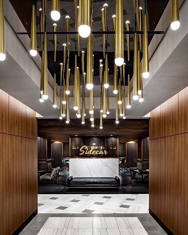 All of the lights ✨ Reminiscing on the time I designed a 40&rsquo; chandelier ✨ #throwbackthursday
.
.
.
.
.
. 
#interiors #interiordesign #details #inspiration #inspo #neutral #materials #texture #style #spaces #lobby #elevatorlobby #serene #design 