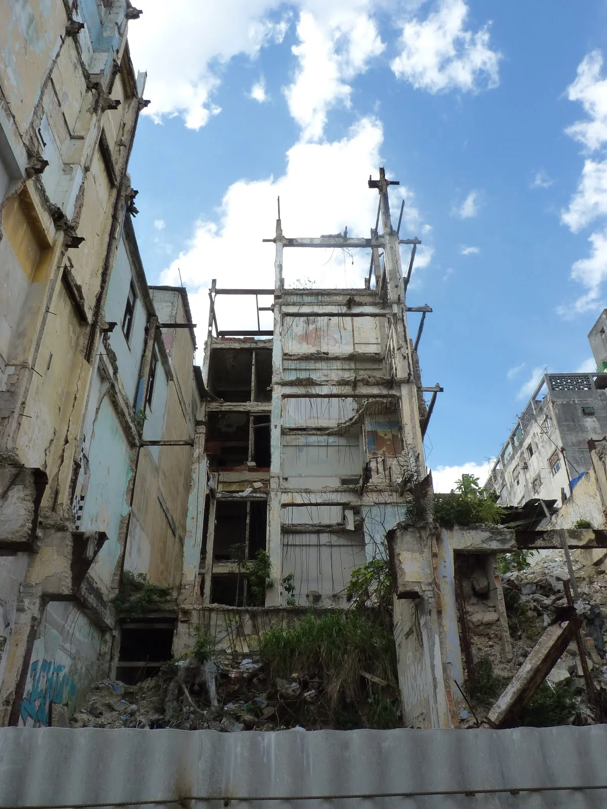 Another building that was falling apart. People would still live in places that would be deemed dangerous, homes where the door of an apartment would open to a gaping abyss rather than a flight of stairs.