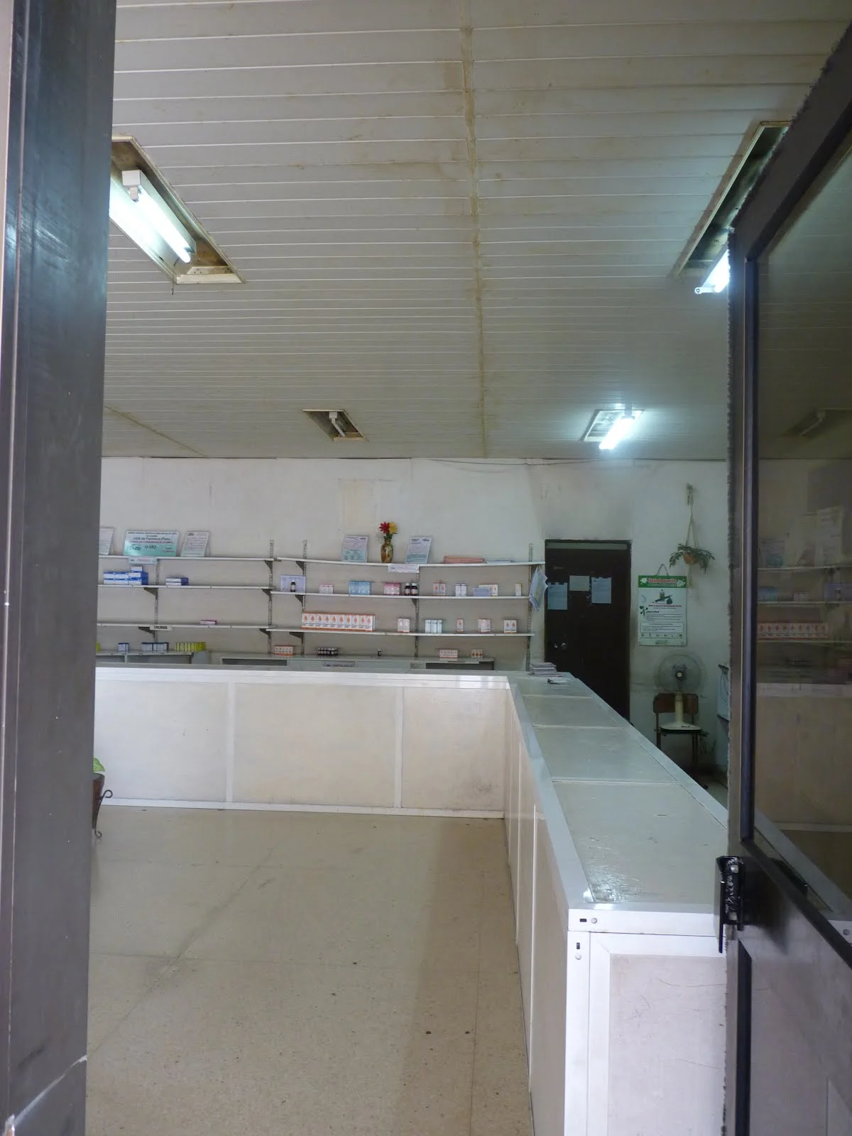A local pharmacy in the bottom stores of the FOCSA building. The shelves are bare. Upon my taking of the picture, a nurse shooed me away.