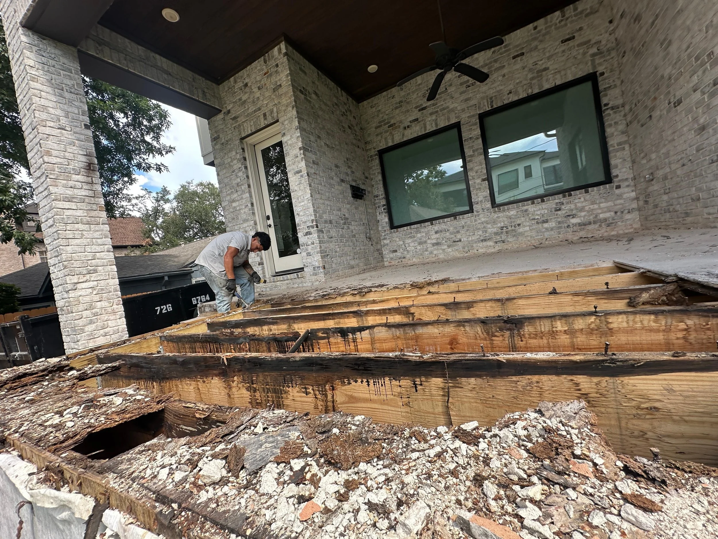 We stripped the porch down to the studs. The beams are also rotten.