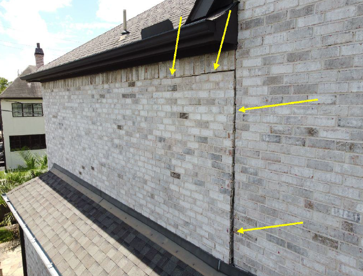 This crack along the brick shows brick separating from the house.