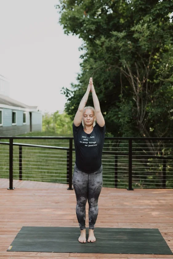 Inhale, Mountain with Arms Overhead (Utthita Tadasana) Engage your glutes and hamstrings. Wiggle your toes and ground down into the mat. Inhale and extend from your pelvis up through the crown of your head while keeping your chest lifted and open. Stay here for several breaths, notice how you feel, then release.