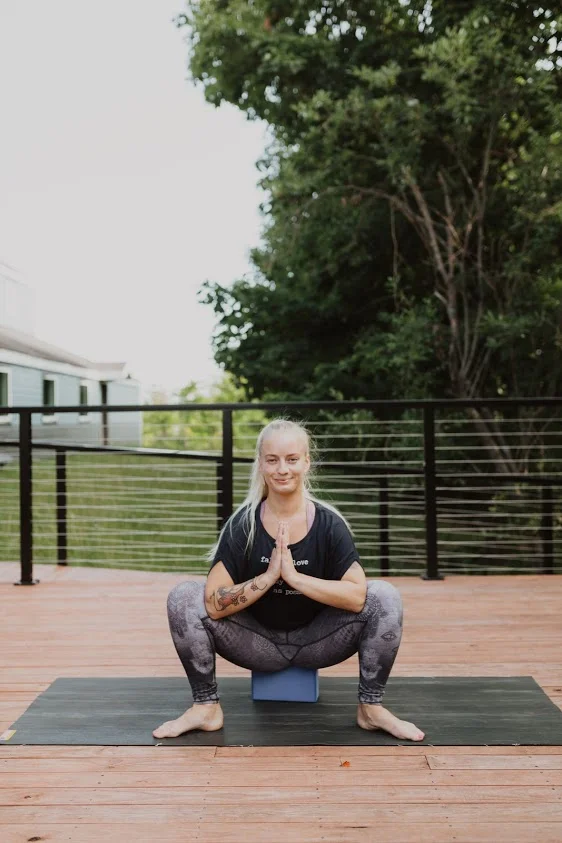 Yogi Squat (Malasana) Breathe into your malasana. A block under the bum can also be supportive in this posture. If you don’t have a block, again avoid sinking into the position and rather remain lifted and engaged. Are you starting to feel like a happy little yogi like Joella?
