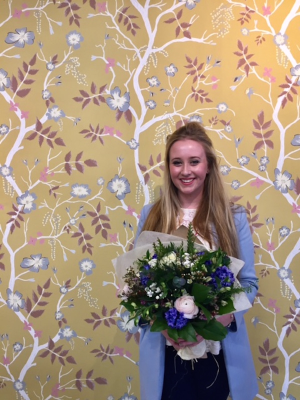 Lucinda Rogers with her winning design, Cinda Roses, which retails at £58.80 per m
