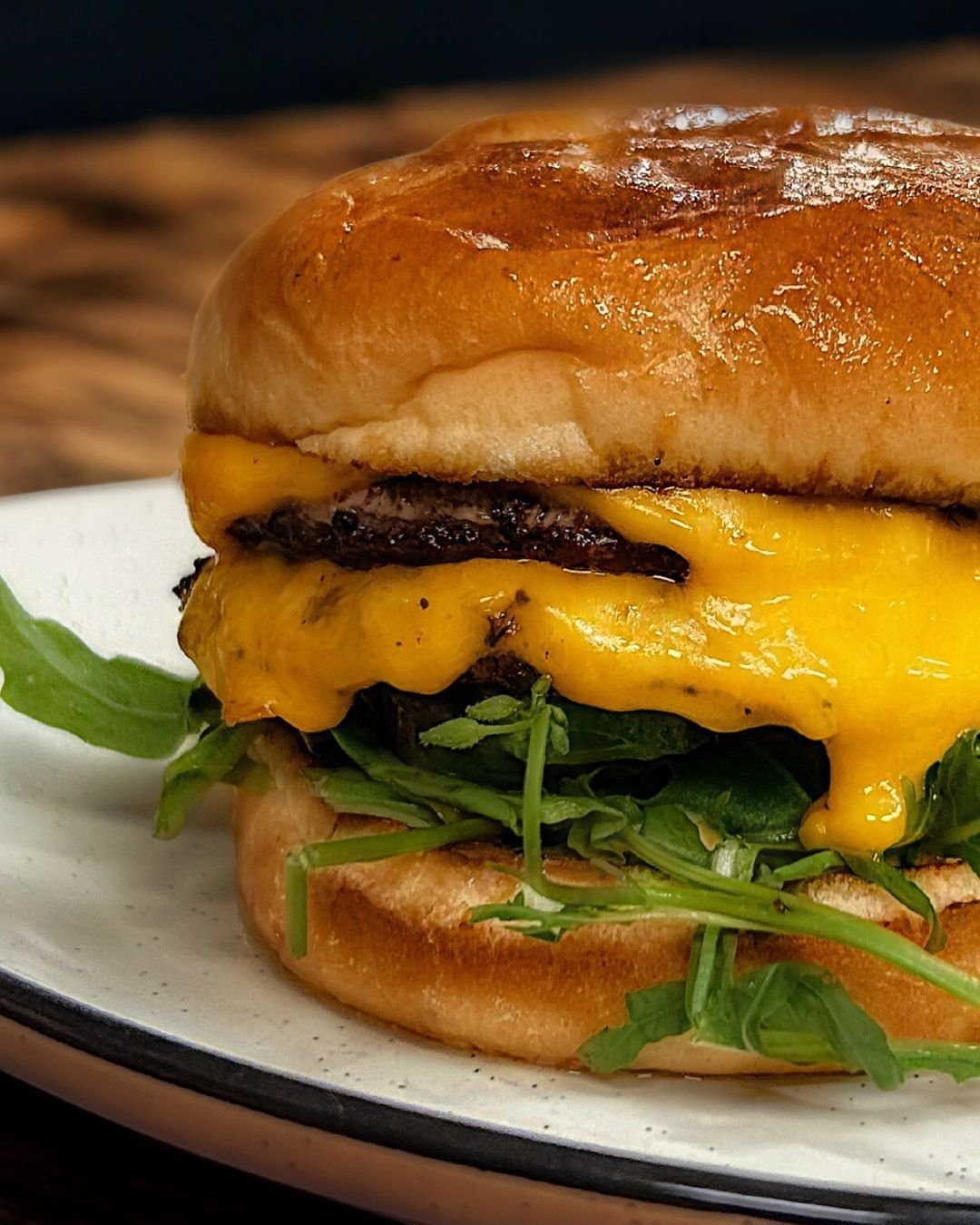 Calling all Friendsmas crews! 🎄✨ Enjoy restaurant-wide Happy Hour Tues&ndash;Thurs&mdash;come in for a HH burger, a drink, or even an appetizer (or all three 😉).