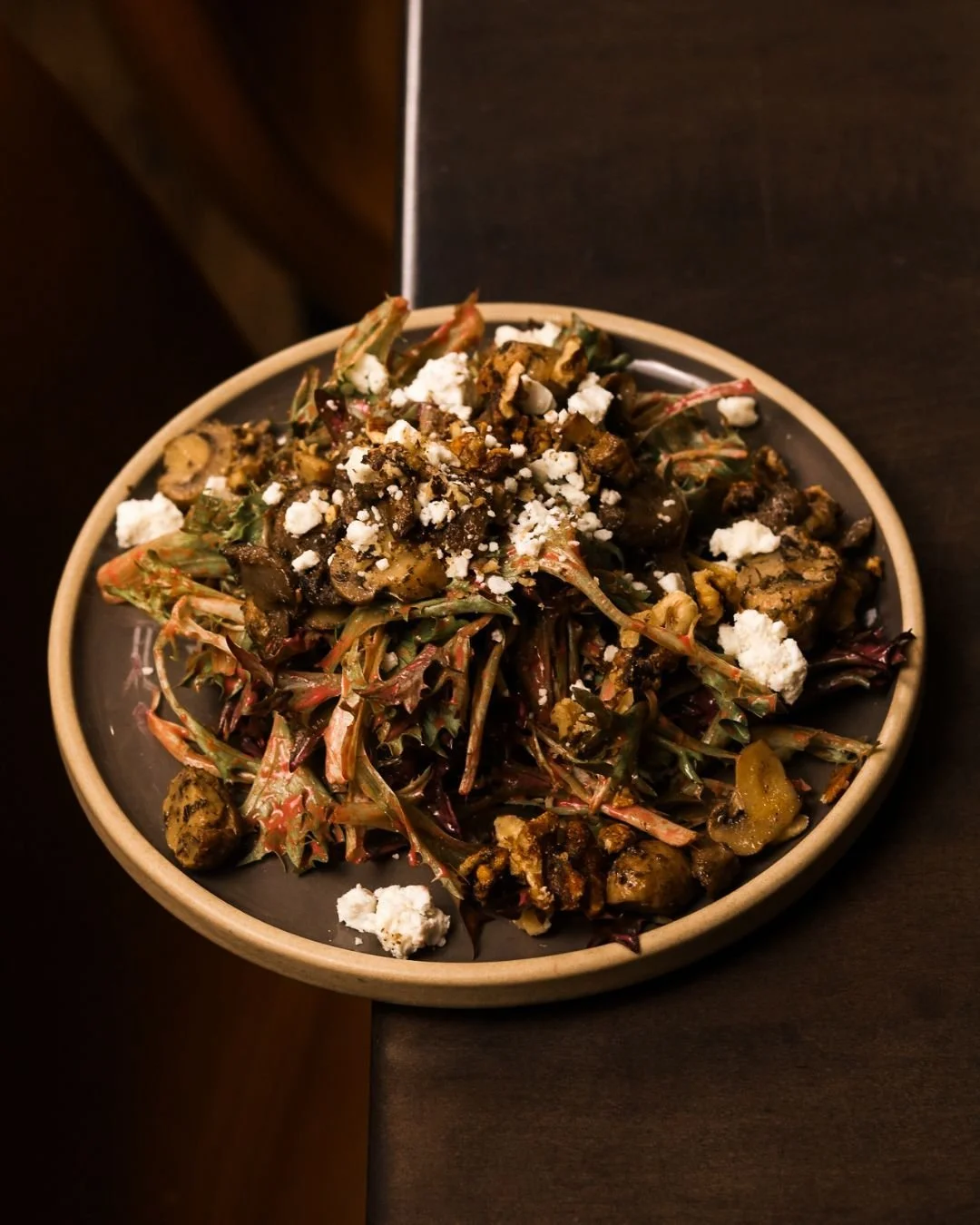 Earthy, bright, and perfectly balanced 🍄✨

Our Warm Mushroom Salad features saut&eacute;ed mushrooms over fresh mixed greens, finished with candied walnuts, creamy goat cheese, and raspberry vinaigrette.

Sweet. Savory. A little tangy.
The kind of s