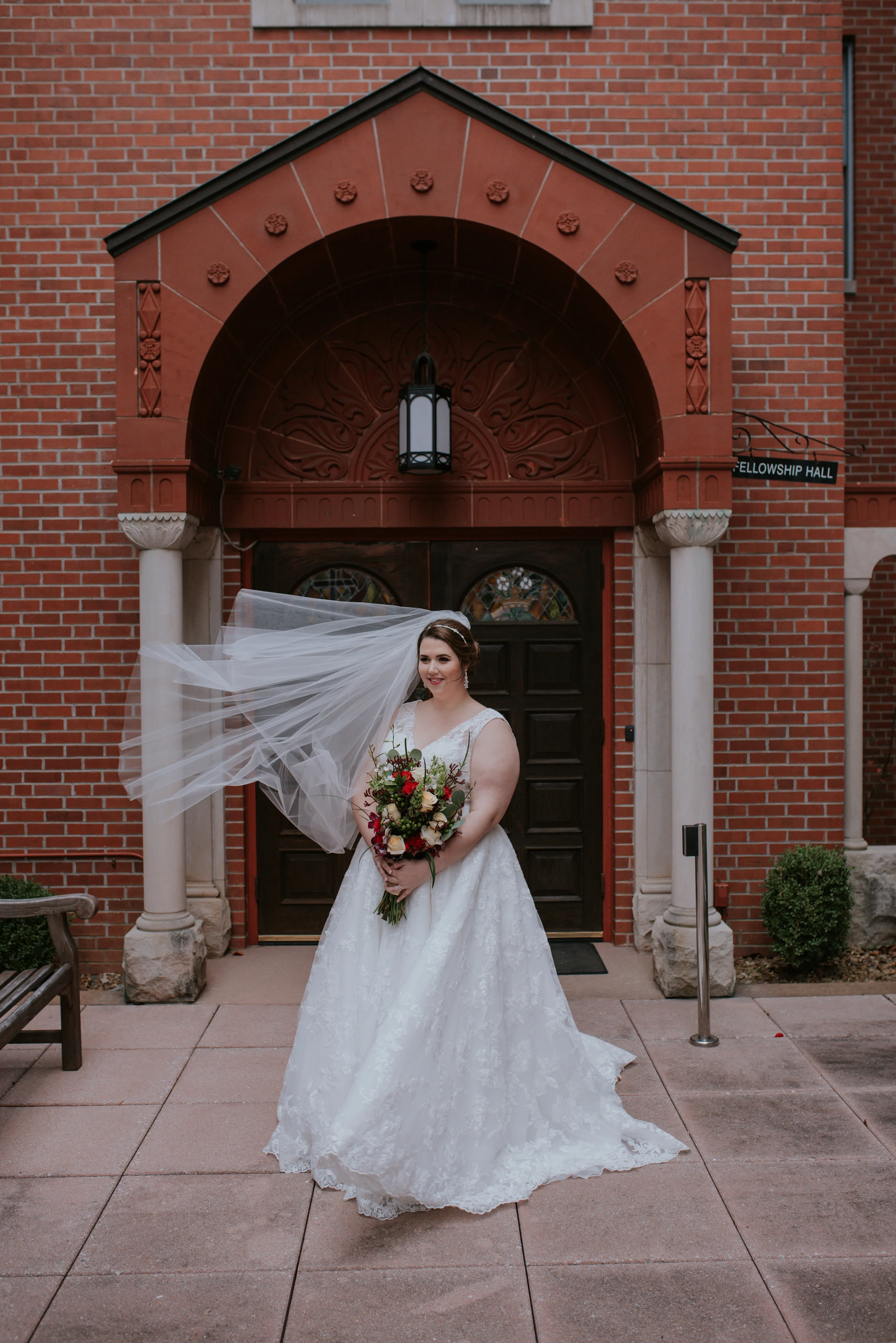 Amanda found her beautiful ivory gown at Low’s Bridal in Arkansas.