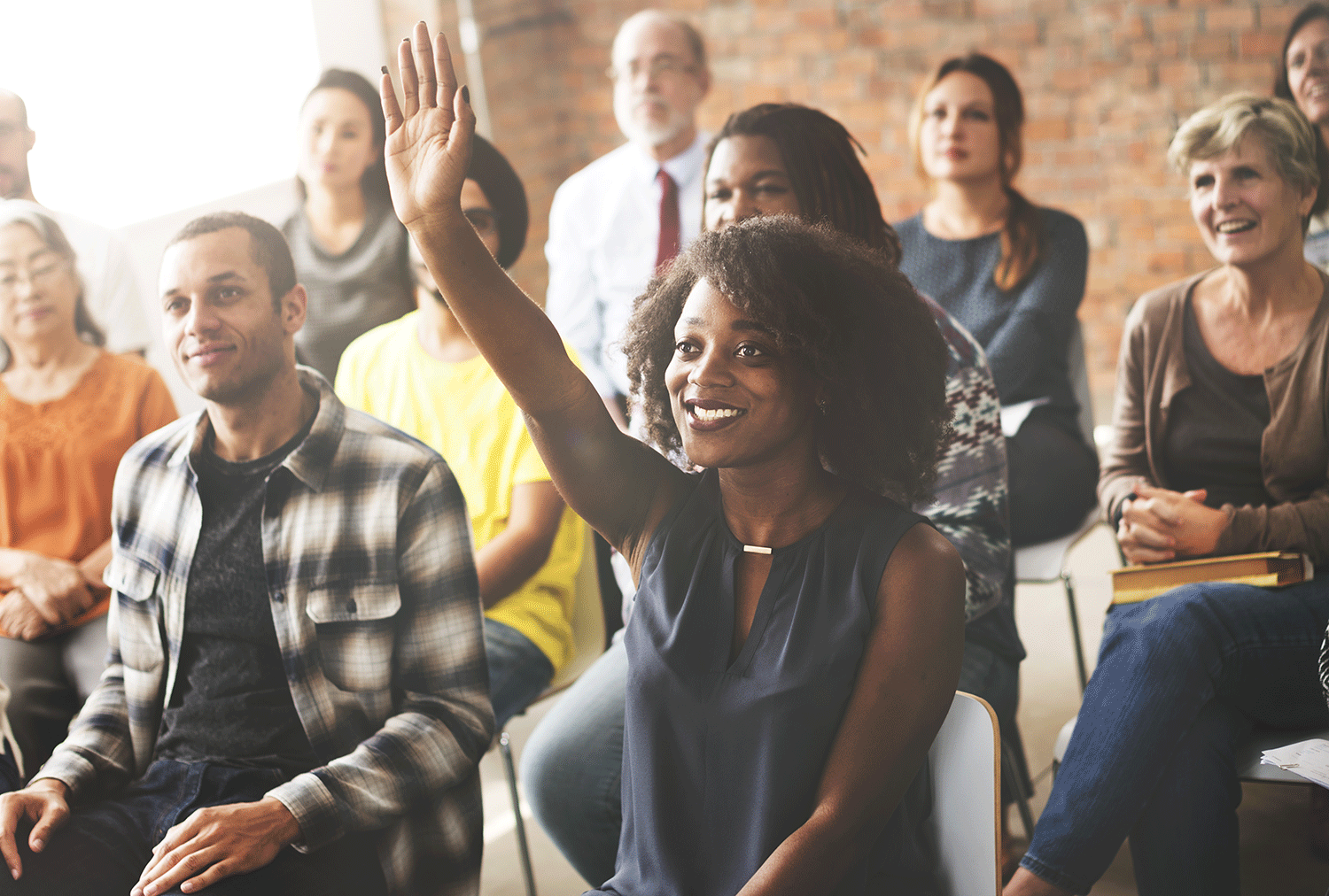 Woman-Raising-Hand-in-Training.gif
