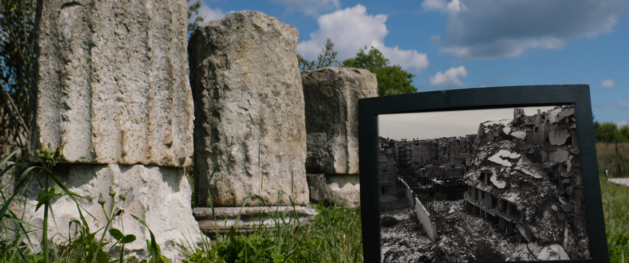 Greek Columns in Lesvos Greece Behind Television Playing Old Video