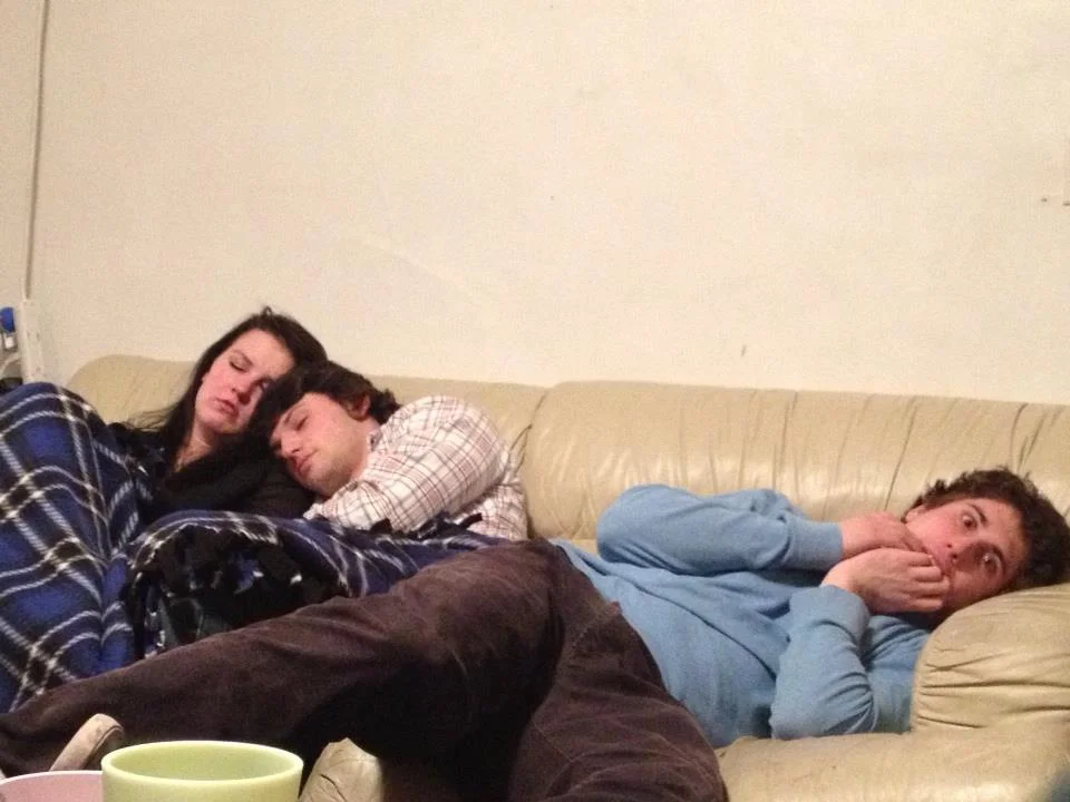 Me making an insane face as Annie Wheeler and Caz Rafalik sleep peacefully, Winter 2013. 