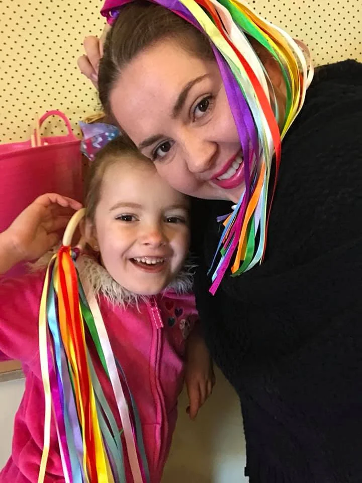 Ms Rainbow: Biloela performing arts teacher Rhona Bechaz with five year old daughter Isla.