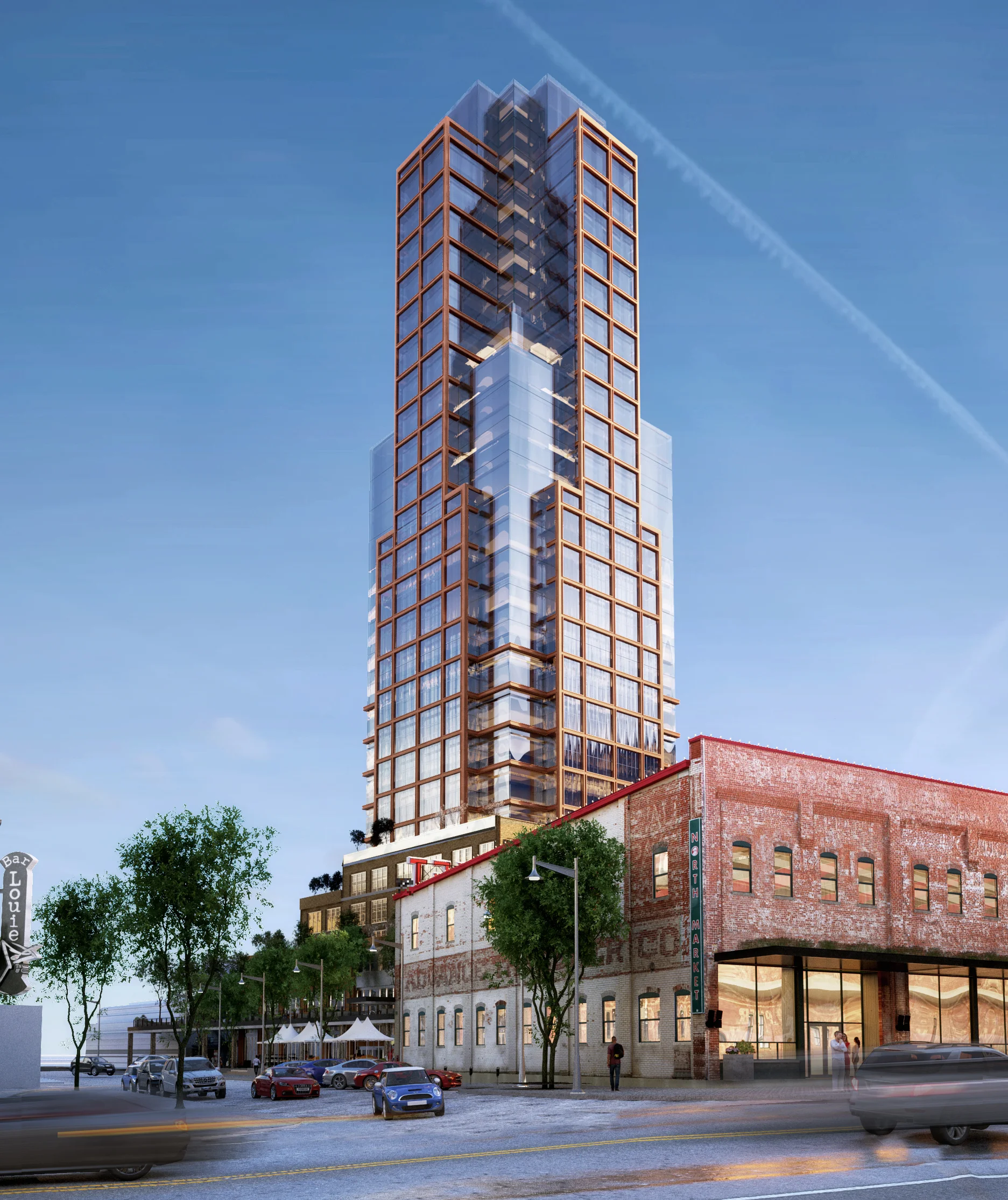 The materials have been selected to complement the other buildings in the district. On the three-story base we’ve chosen to use traditional brick masonry with deeply punched window openings to relate to the scale, rhythm and depth of the surrounding neighborhood buildings. Moving up, the brick masonry continues but we begin to lighten the expression and form by integrating terra cotta banding and larger amounts of glass, allowing the glass to eventually become the defining expression at top of the building. The resulting Market Tower is contextual and respectful of its surroundings – it is a building that could only be built on this particular site. Market Tower is also modern and graceful, a beautiful new element of our city’s skyline.