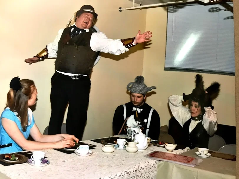 The Mad Hatter launches into song.