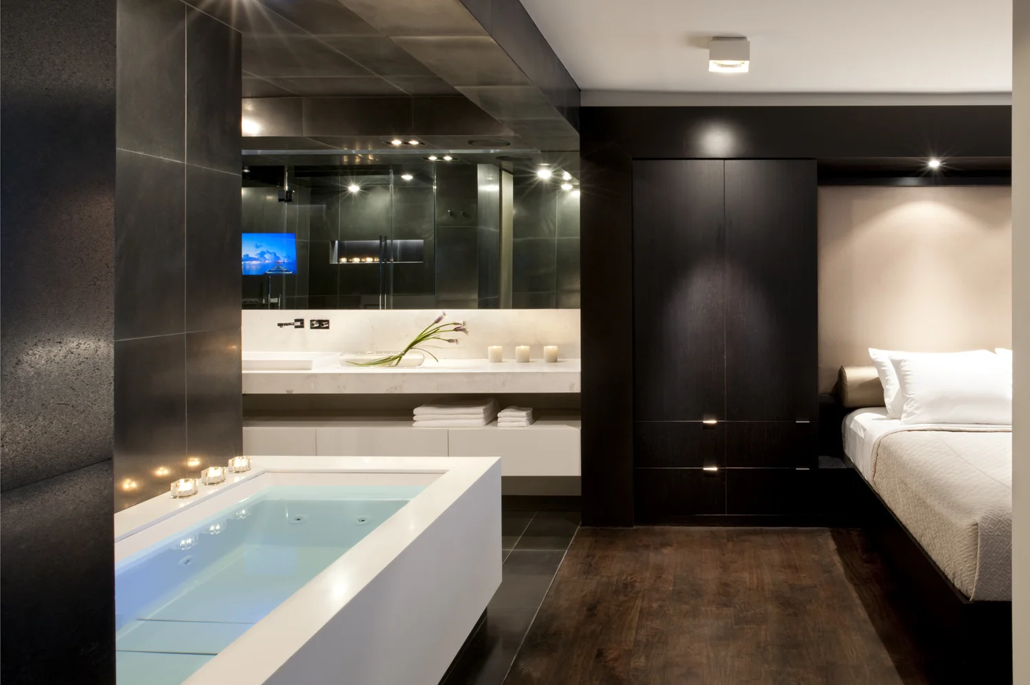 INTERIOR CONVERSION - APARTMENT UNITS TO HOTEL SUITES SCOPE OF WORK: PRELIMINARY DESIGN, DESIGN DEVELOPMENT, CONSTRUCTION DOCUMENTS, CONSTRUCTION ADMINISTRATION, INTERIOR FURNISHINGS AND ACCESSORIES, LIGHTING DESIGN, FINISH, FIXTURE AND EQUIPMENT SELECTIONS, ART CURATION AND CUSTOM MILLWORK/FURNITURE DESIGN