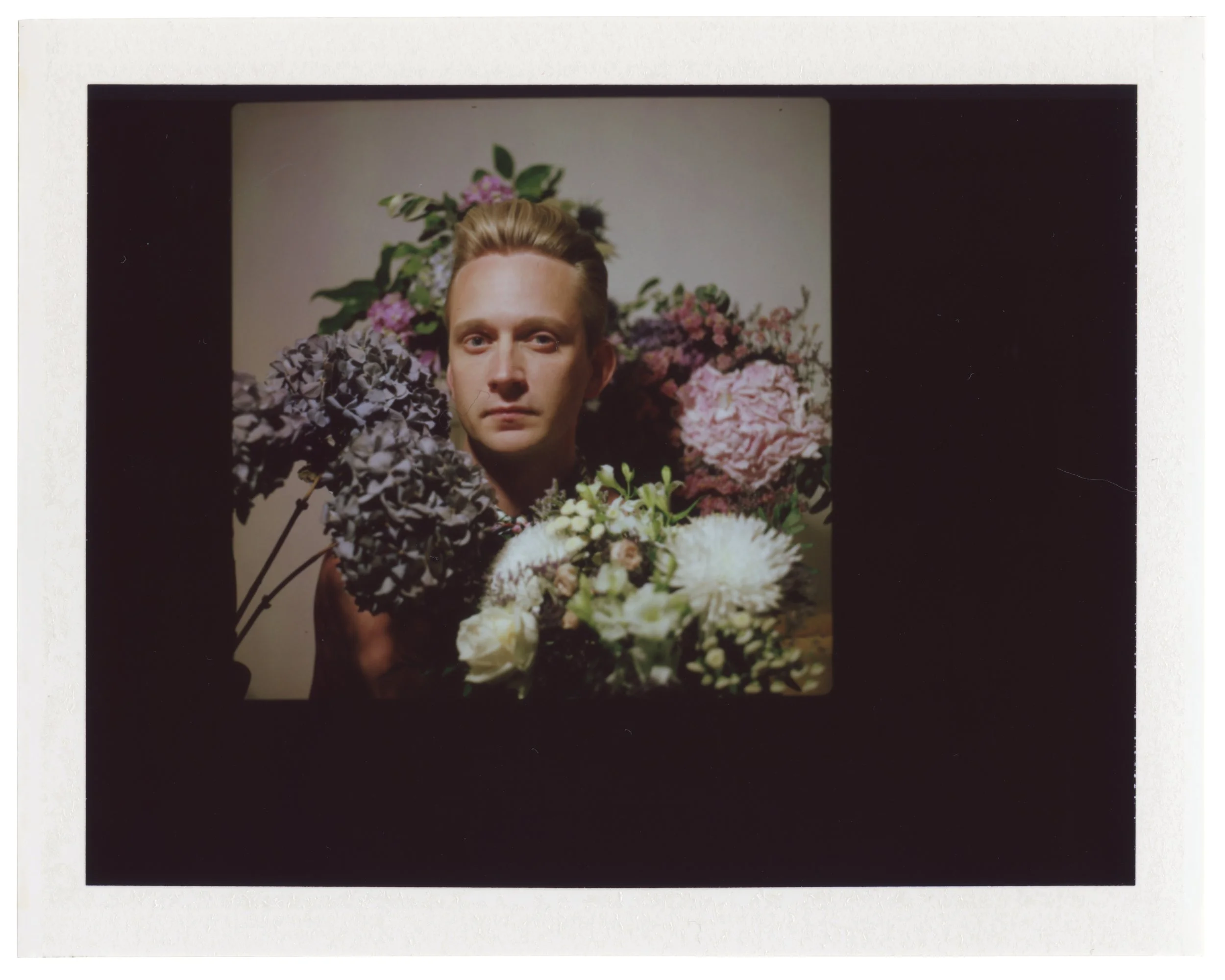 Erik with flowers, July 1 2019 (Hasselblad 500C/M, FP-100c)