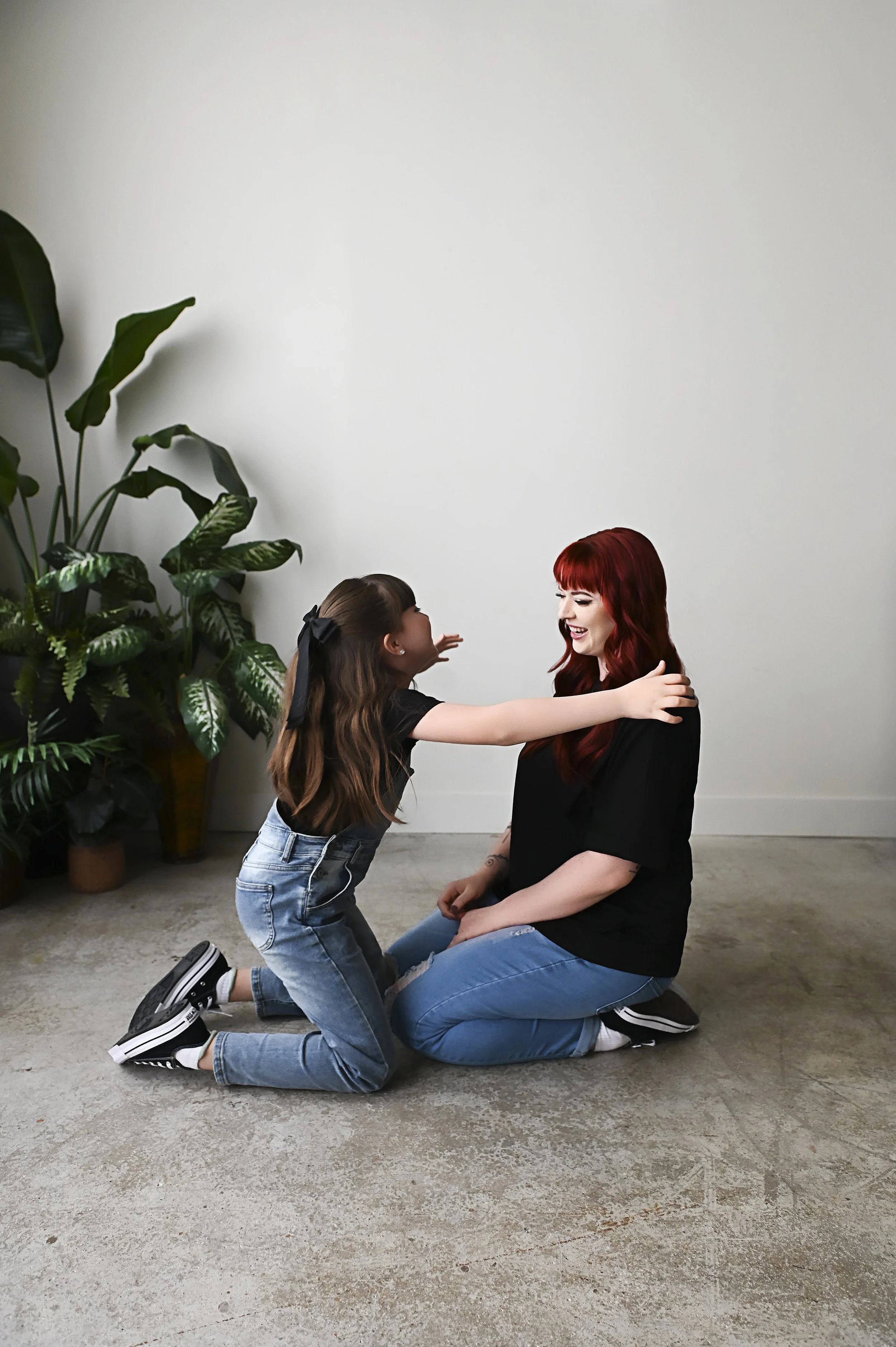 mother and daughter holding hands during motherhood photography session in Shreveport Louisiana