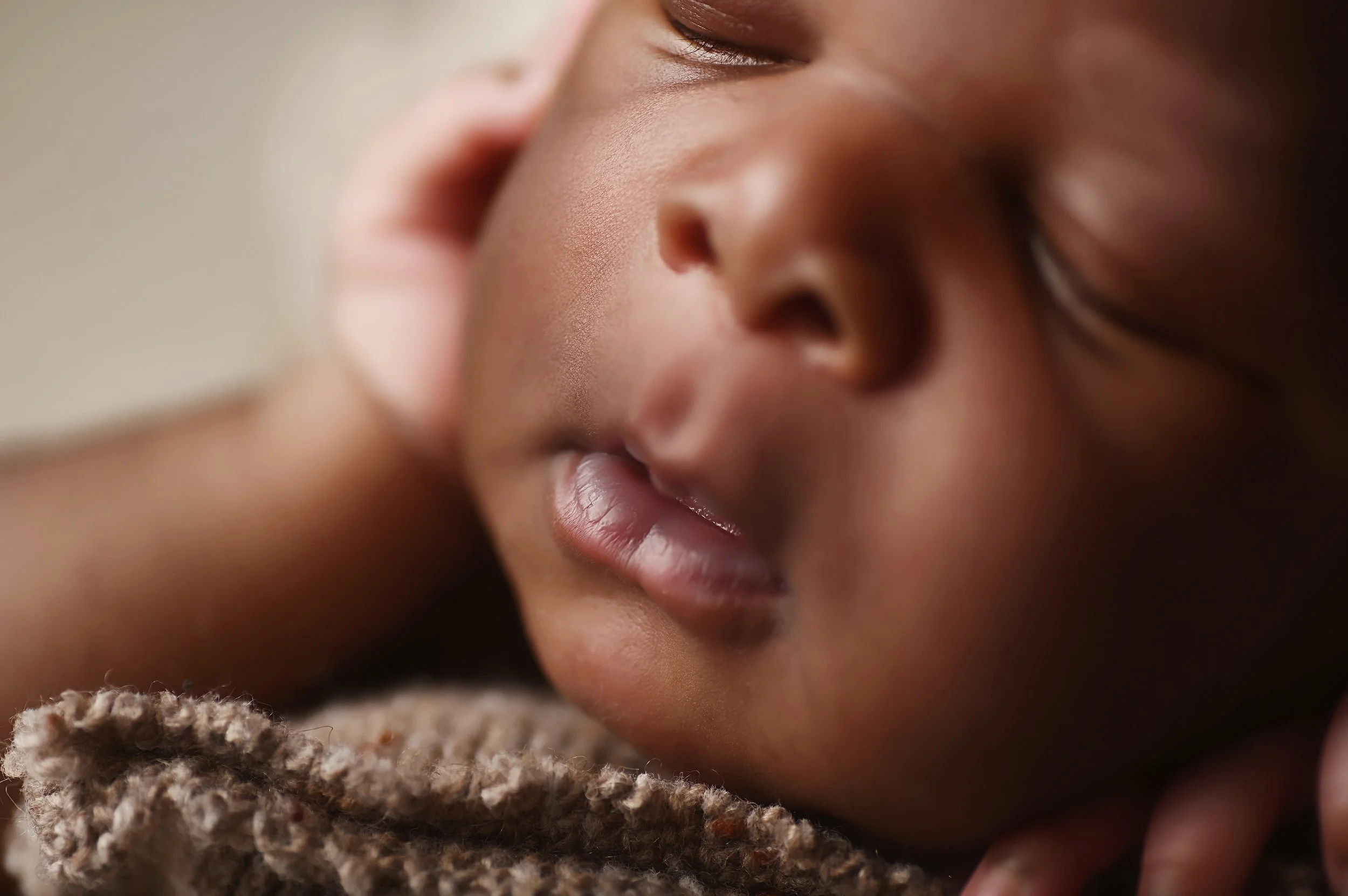 Close-up detail of a newborn baby’s lips and nose captured during a studio newborn session in Shreveport.