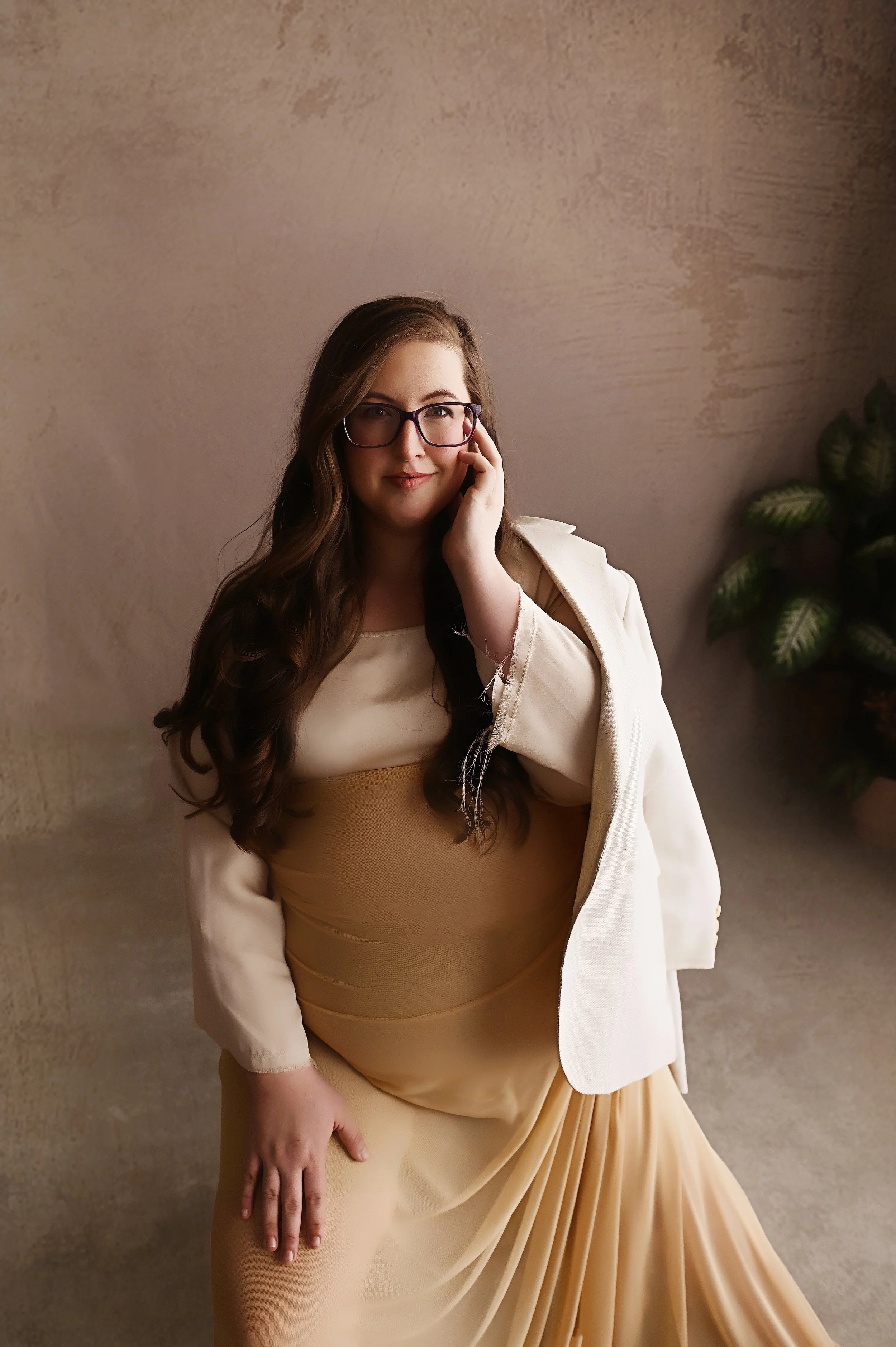 Elegant studio maternity portrait in Shreveport Louisiana with neutral tones