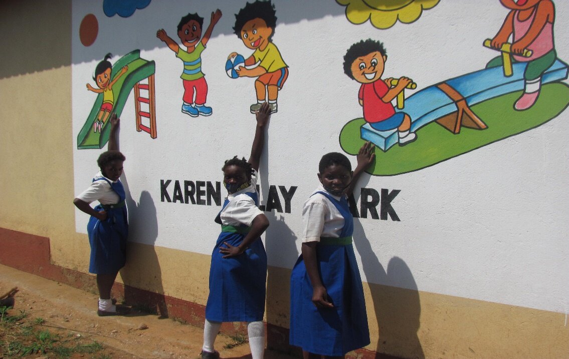 Mural with students.jpg