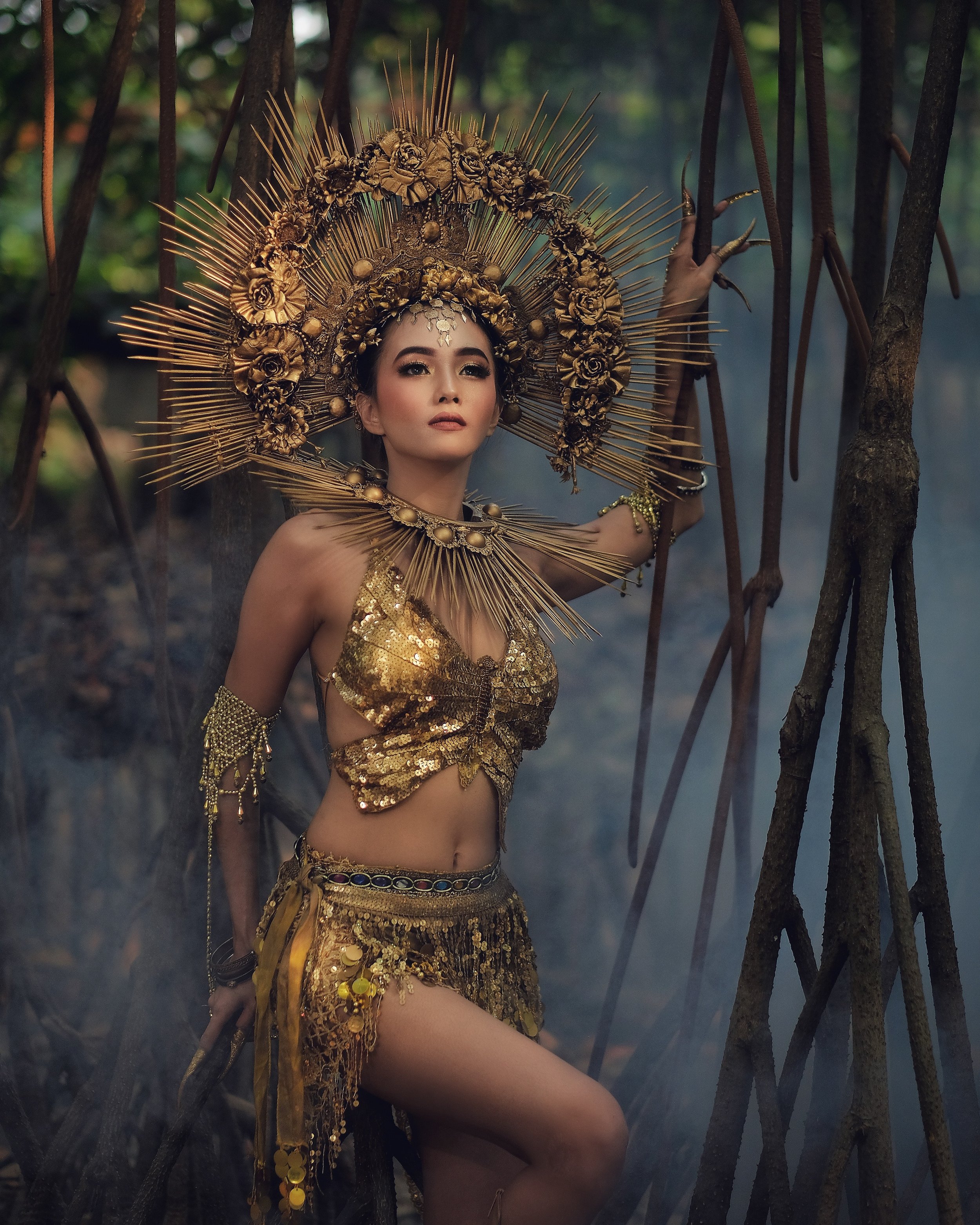 woman-standing-while-holding-branch-2872073.jpg