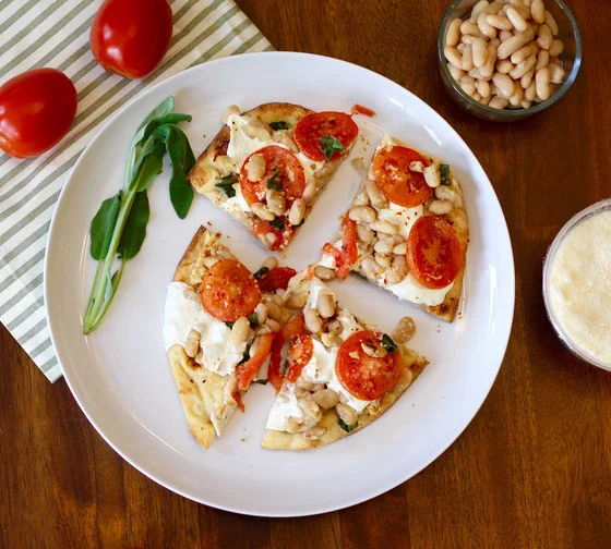 looking-for-healthy-recipes-this-tomato-and-white-bean-naan-pizza-is-vegetarian-and-can-be-eaten-for-breakfast-lunch-or-dinner-just-pop-it-in-the-oven.jpg