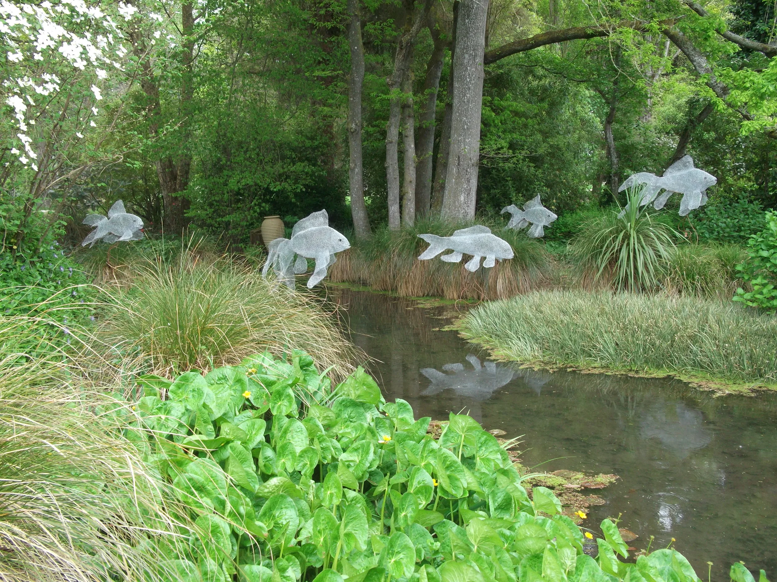 Carassius Argentum Magnus - five individual giant goldfish sculptures at Art in a Garden